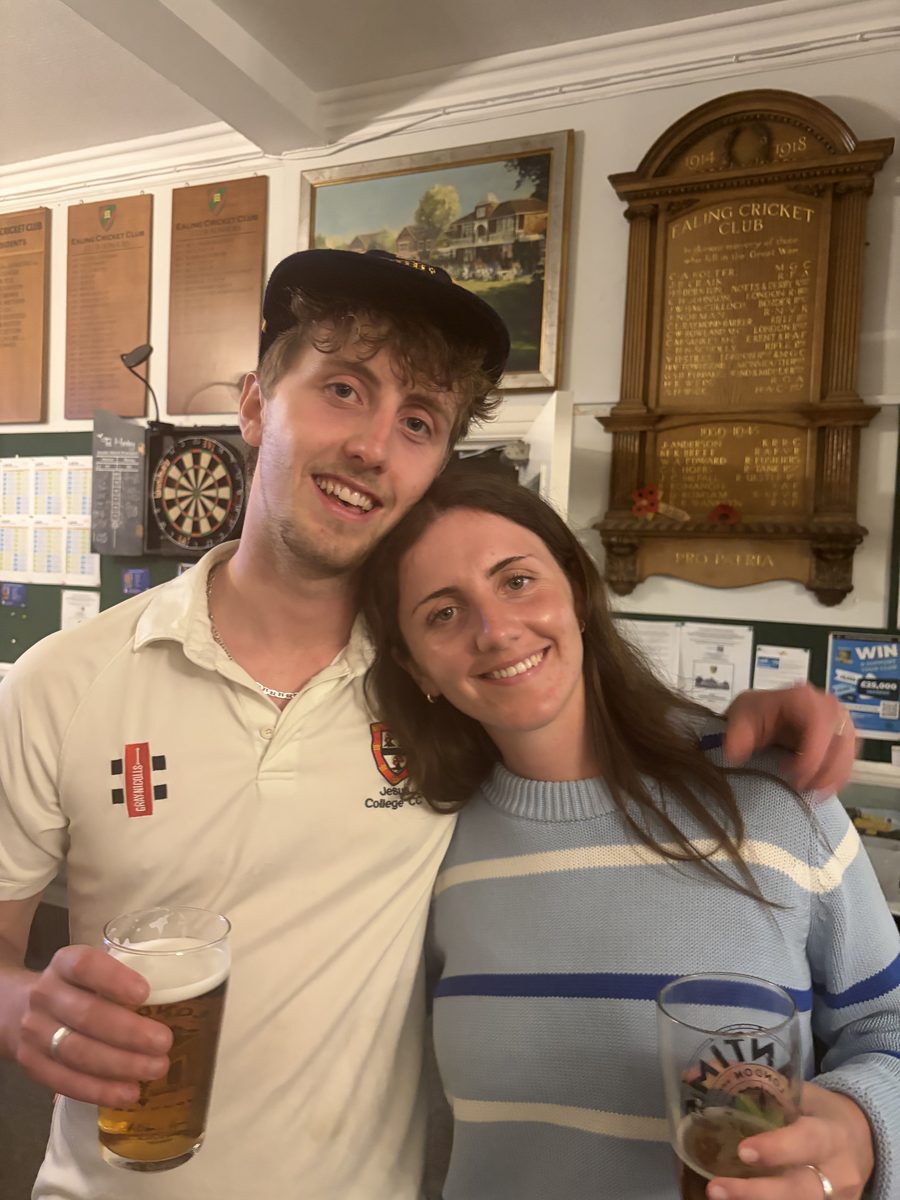 Players sharing a drink after the match at the club